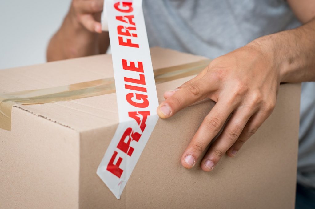 box with fragile tape