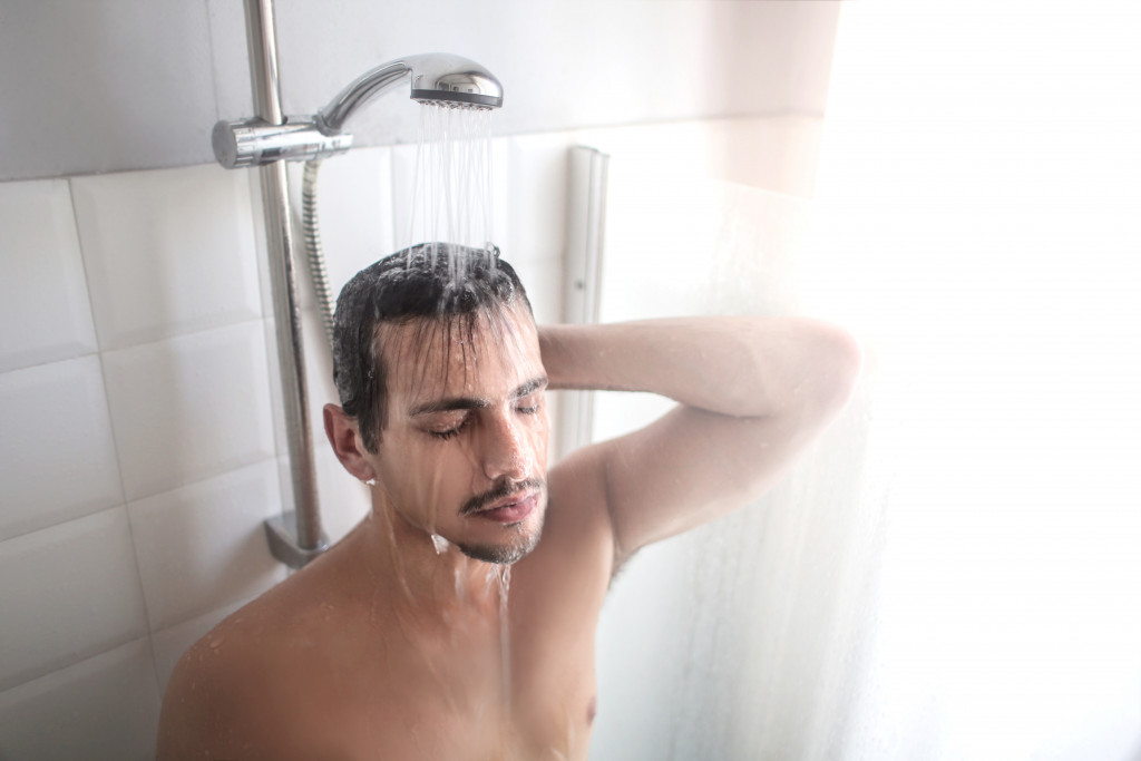 man taking a shower