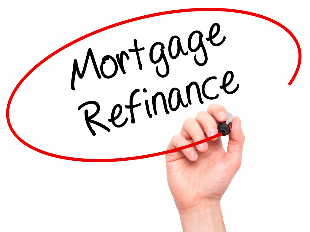 writing mortgage refinance and encircling it