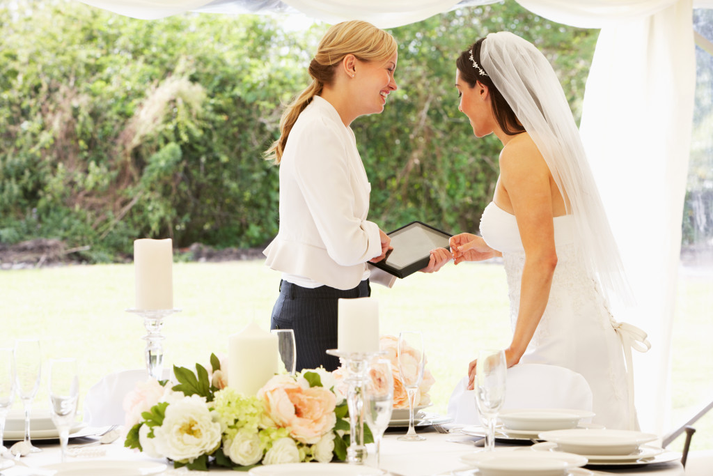 a wedding planner and bride