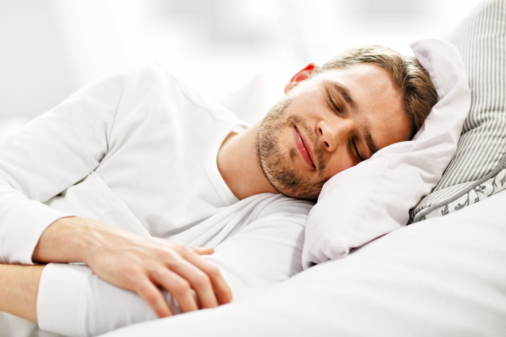 smiling man asleep