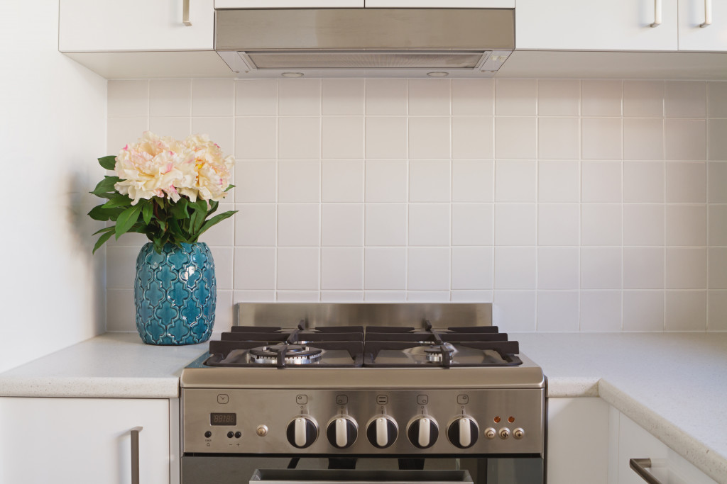 kitchen oven closeup with flowers