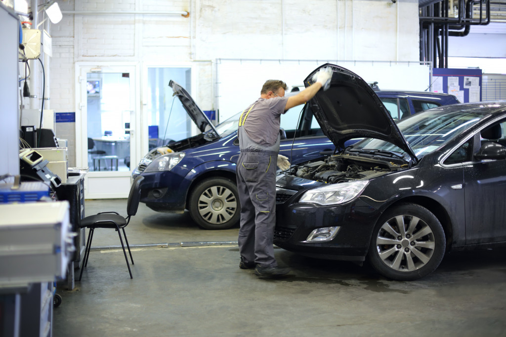 Vehicles being serviced in a service shop