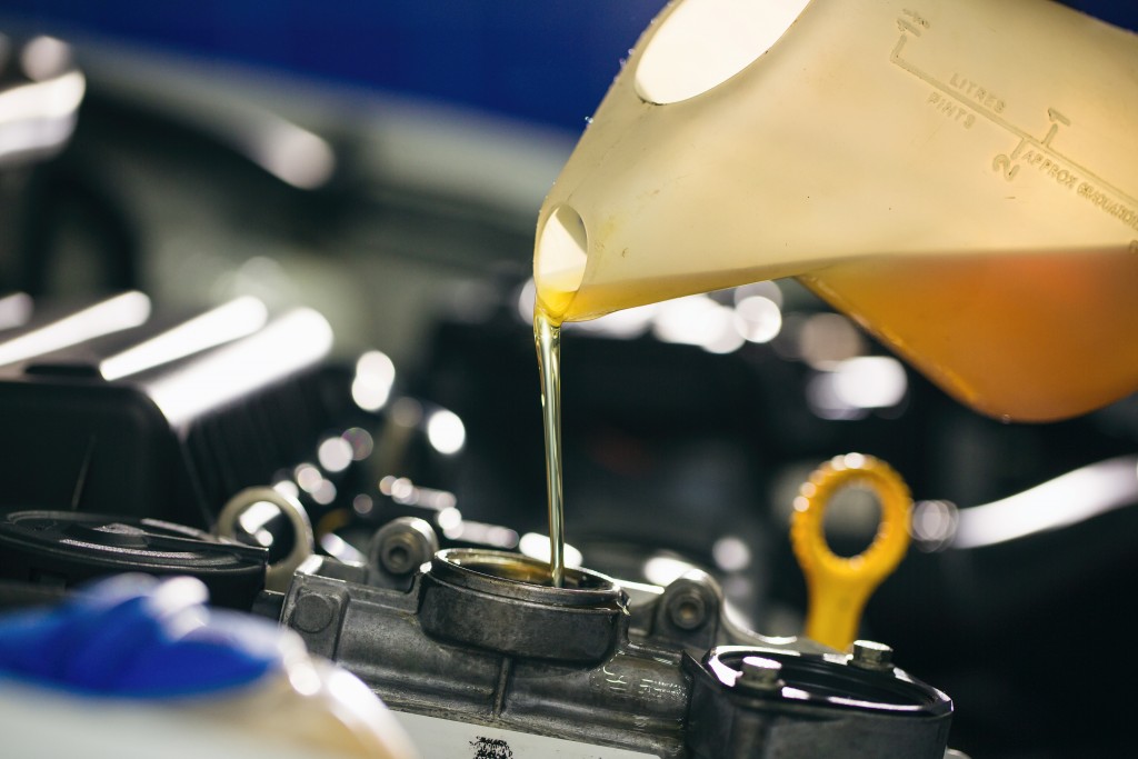 pouring new fuel to a car