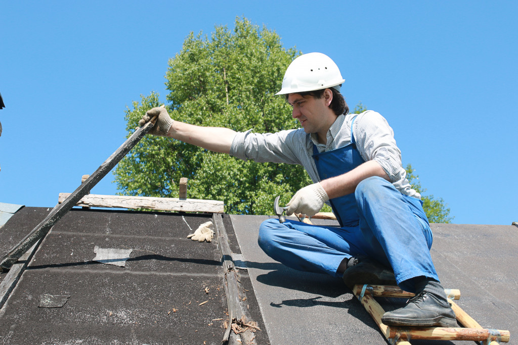 Roofing contractor at work