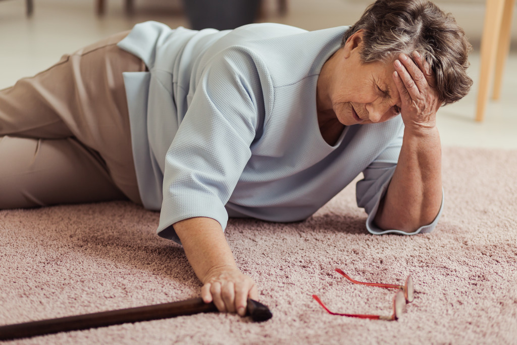 female senior on the floor after falling