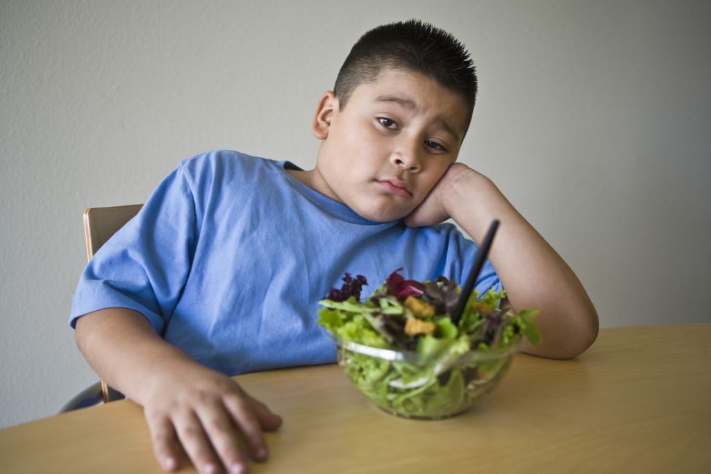 Obese child refusing to eat salad