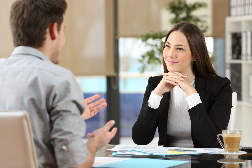 manager speaking with employee