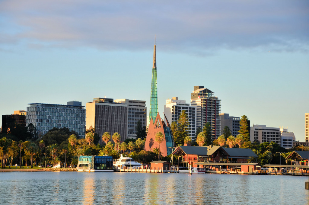 overview of the city of Perth in australia across body of water