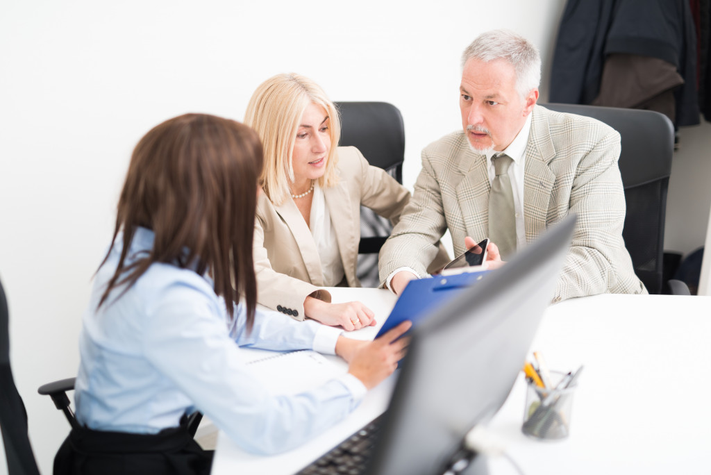 Executives working on a business plan in an office.